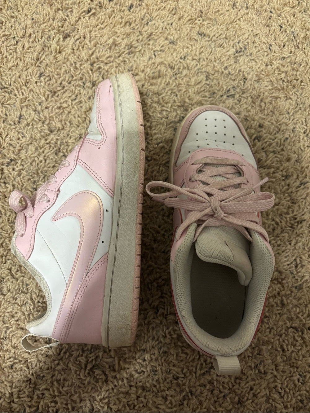 Nike pink and white sneakers